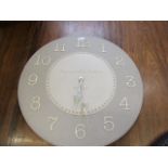 A ceramic wall clock