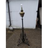 Ornate wrought iron floor standing oil lamp converted to electric