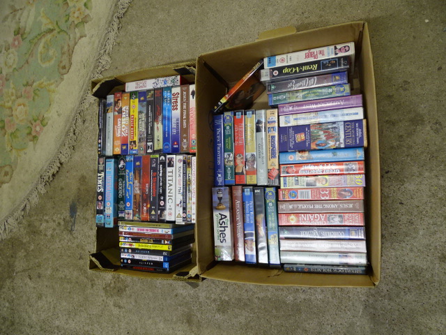 2 Boxes of VHS tapes, DVD'S and Blu-rays