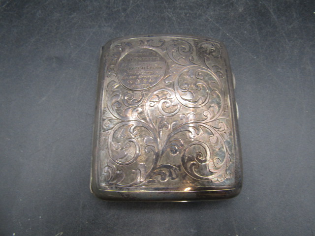 A silver cigarette case with presentation inscription to C. Roberts (medals in militaria) 62gms