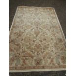 A cream ground wool rug 250x170cm