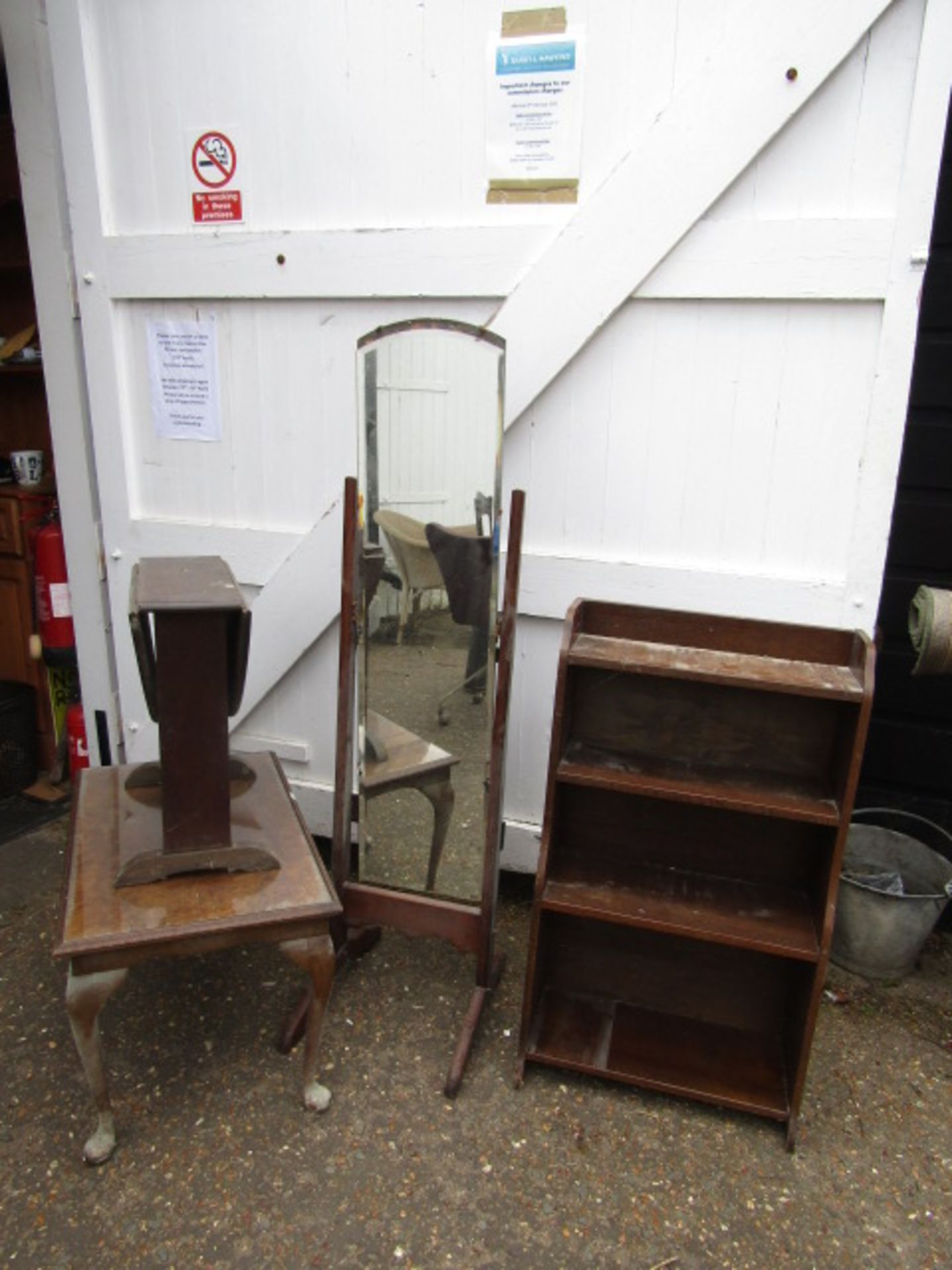 Bookcase, burr walnut veneer coffee table, drop leaf table and mirror