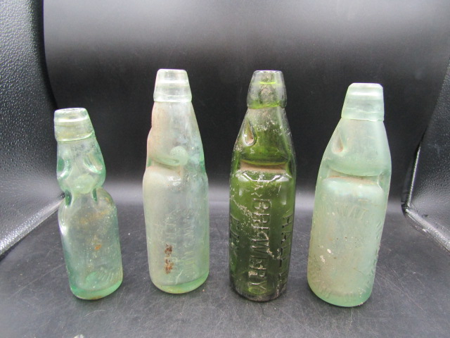 4 codd bottles inc green Ely brewery green codd bottle is in good condition- no chips or cracks etc