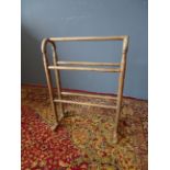 Floor standing towel rail