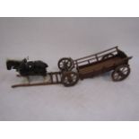 A hand made horse wagon with a ceramic horse cart 40cm long