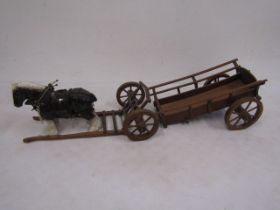 A hand made horse wagon with a ceramic horse cart 40cm long