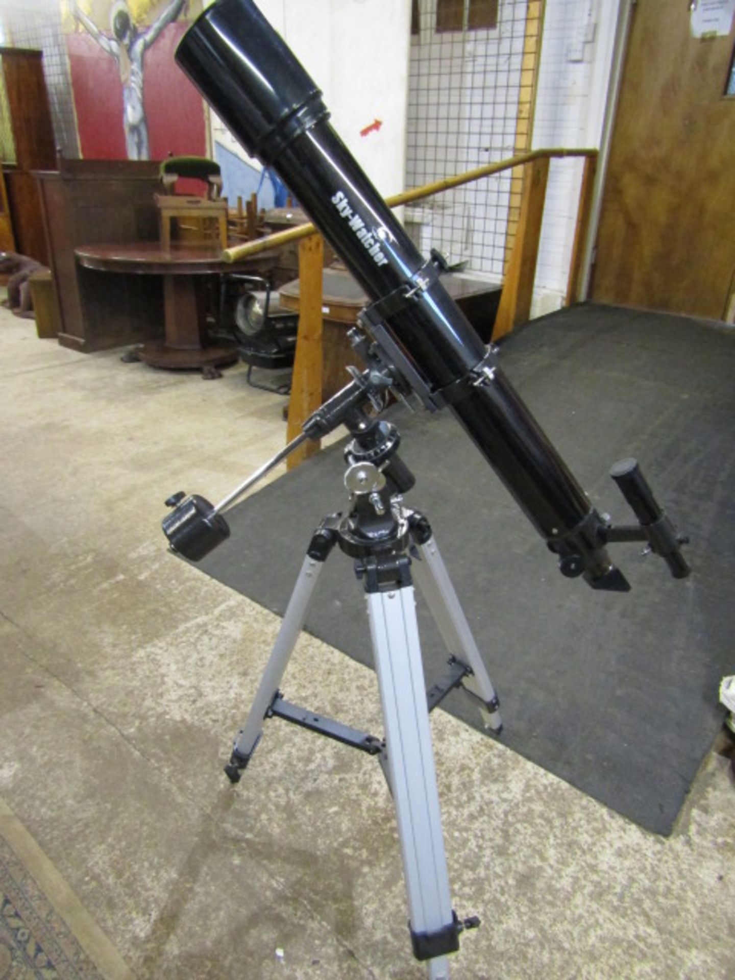 New and unused Sky Walker telescope with stand, box of lenses, book and a canvas cover
