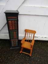 A cd cupboard with book design and a small rocking chair (for teddies or dolls size)