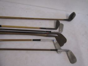 Quantity vintage golf clubs