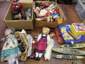 Various dolls and toys