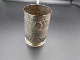 A silver plated Victorian Christening cup with inscription 'DMS 1897' 9 cm tall approx.