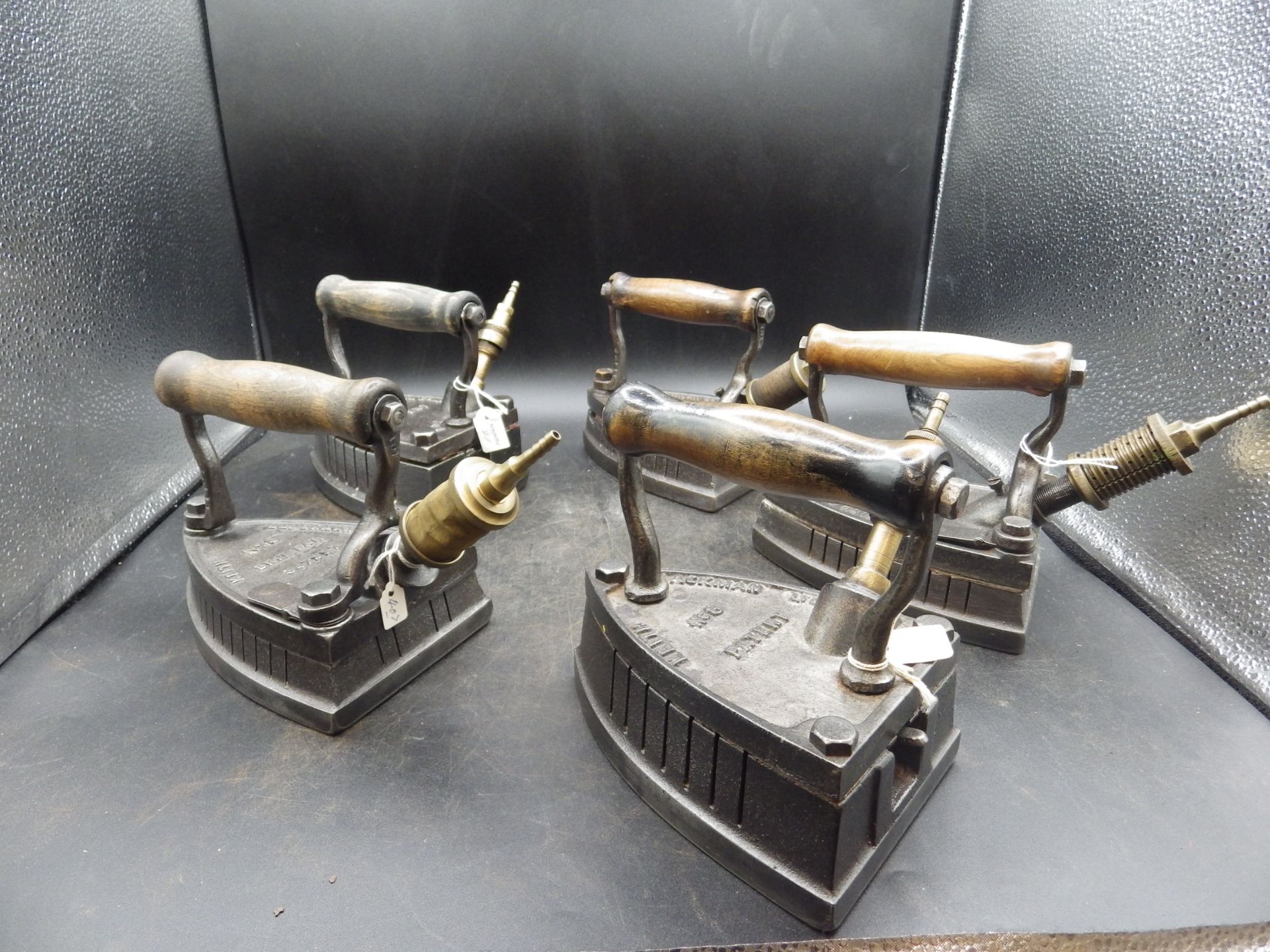 5 James Keith & Blackman Co Ltd No.8 gas irons to incl one marked London - Image 2 of 4