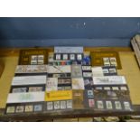 15 1970's/80's mint stamp sets and approx 180 1st day covers from 1980's/90's