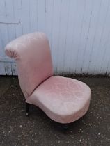 Upholstered bedroom chair on brass castors (one missing)