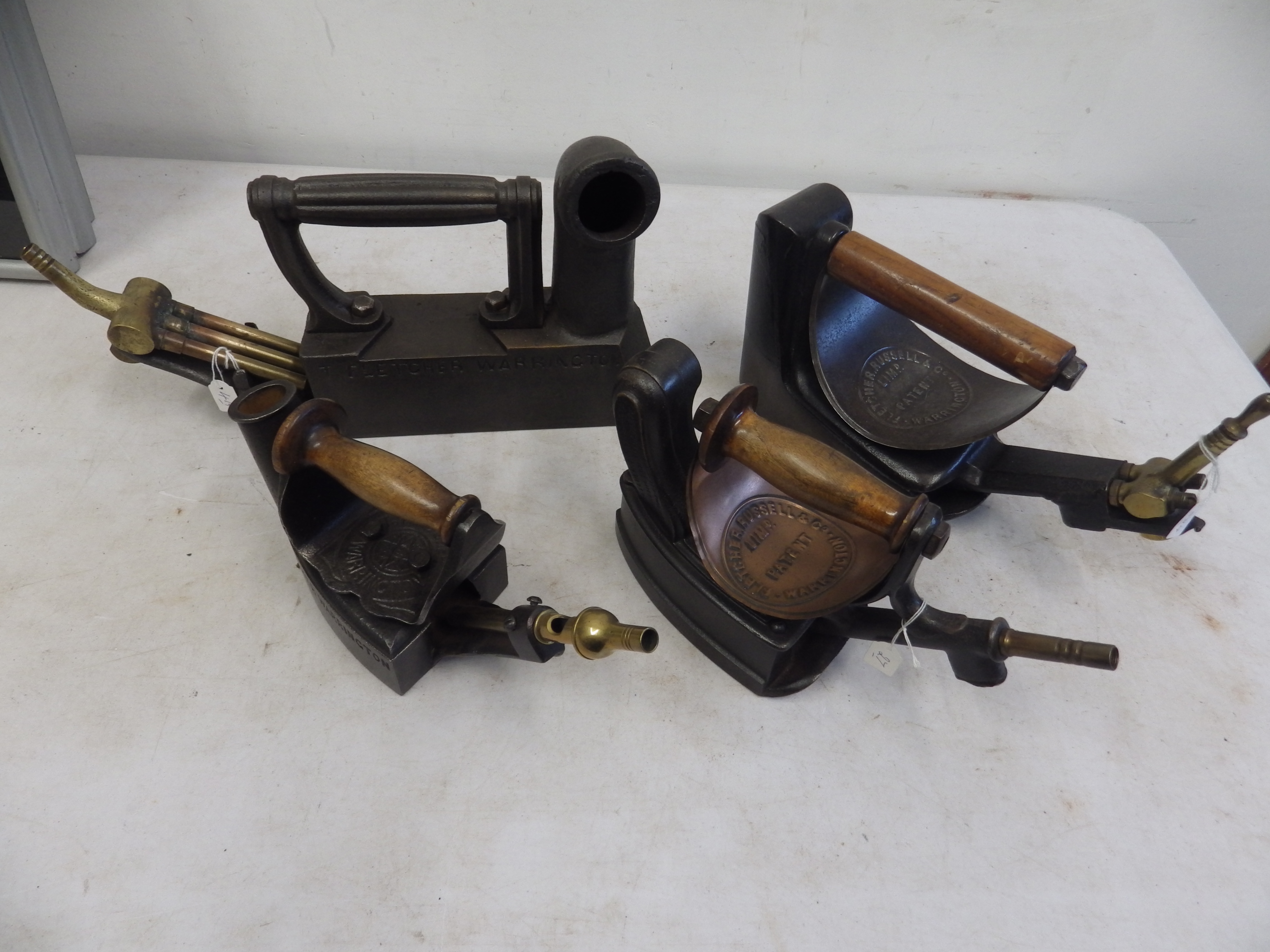 4 Fletcher Russell & Co Ltd gas irons to incl no.5 patent 1885, No.10, another with air vent down