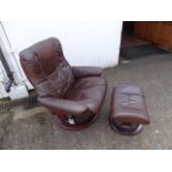 Brown leather Stressless reclining chair with footstool