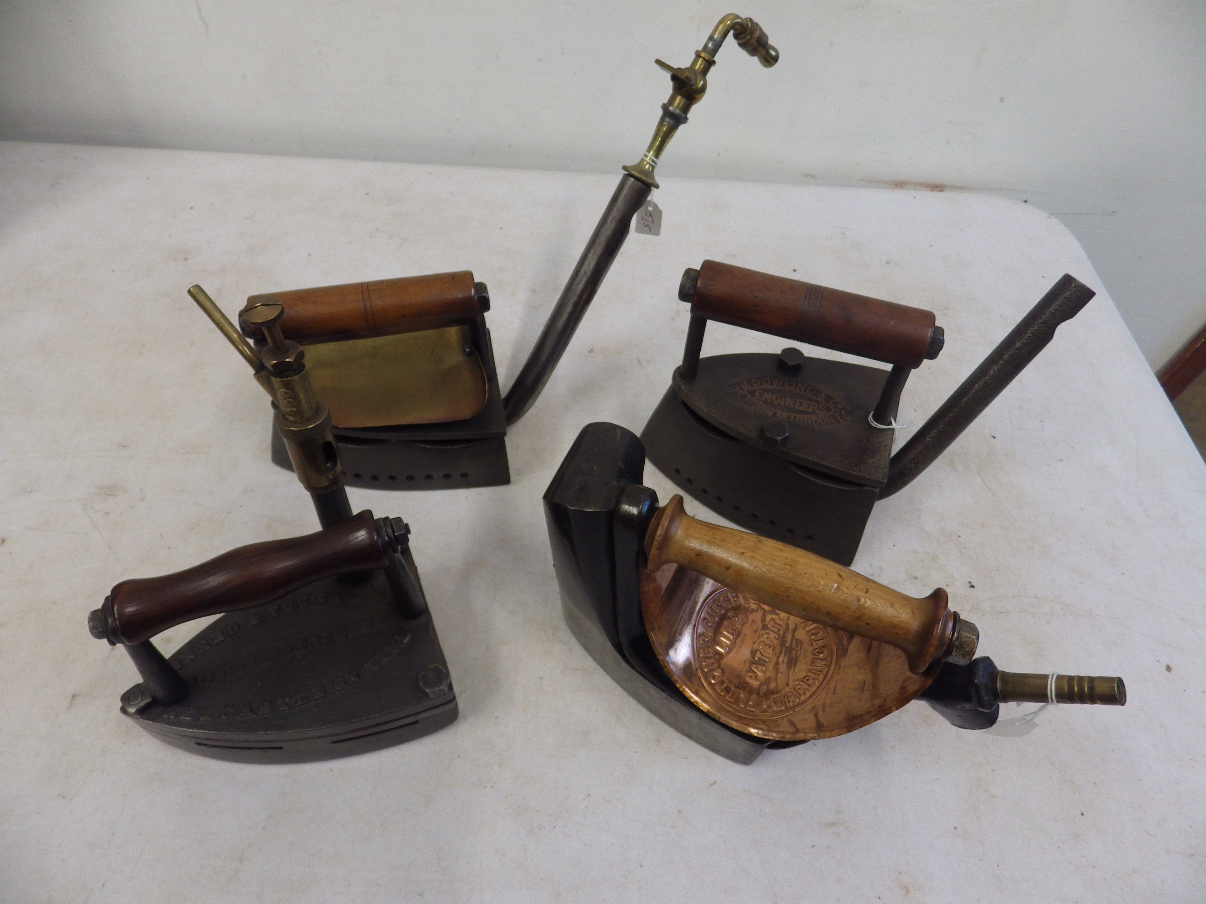 4 assorted gas irons to incl 2x J Dowling & co Engineers London, Innerd & Young Under Engineer