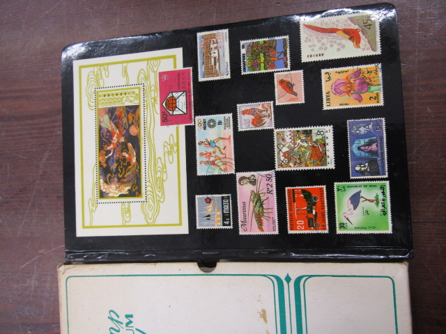 Postage stamps- a sleeved stock book mainly ERII many high value used and mint (a few blocks)