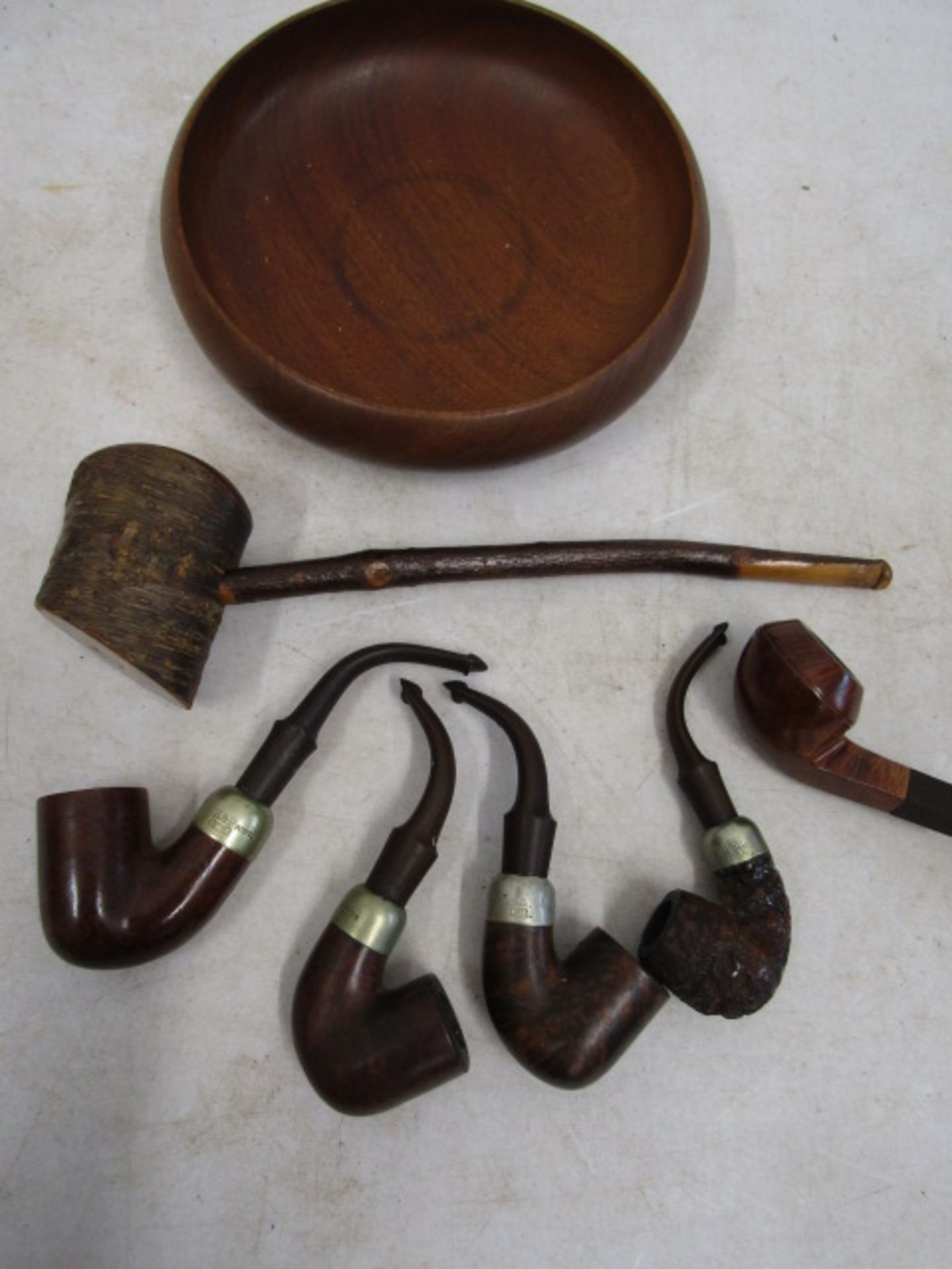 3 Peterson's pipes and 3 others  and wooden dish