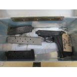 Umarex Walther PPKS CO2 pistol (needs repair) in metal case with some other gun parts