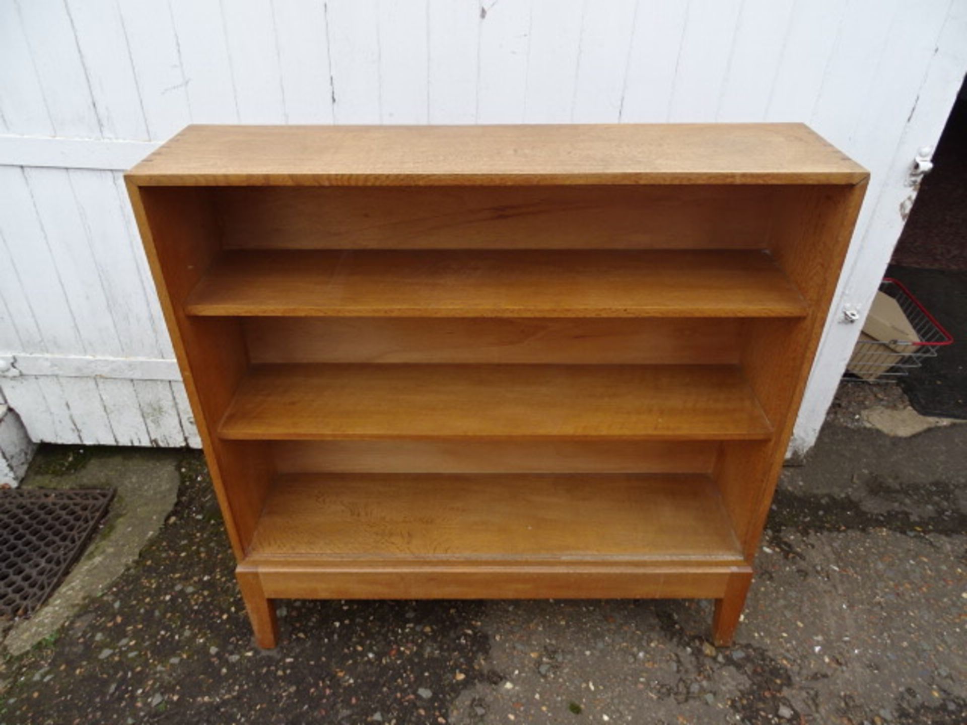 Oak bookcase on legs with dovetailed corners H94cm W92cm D26cm approx