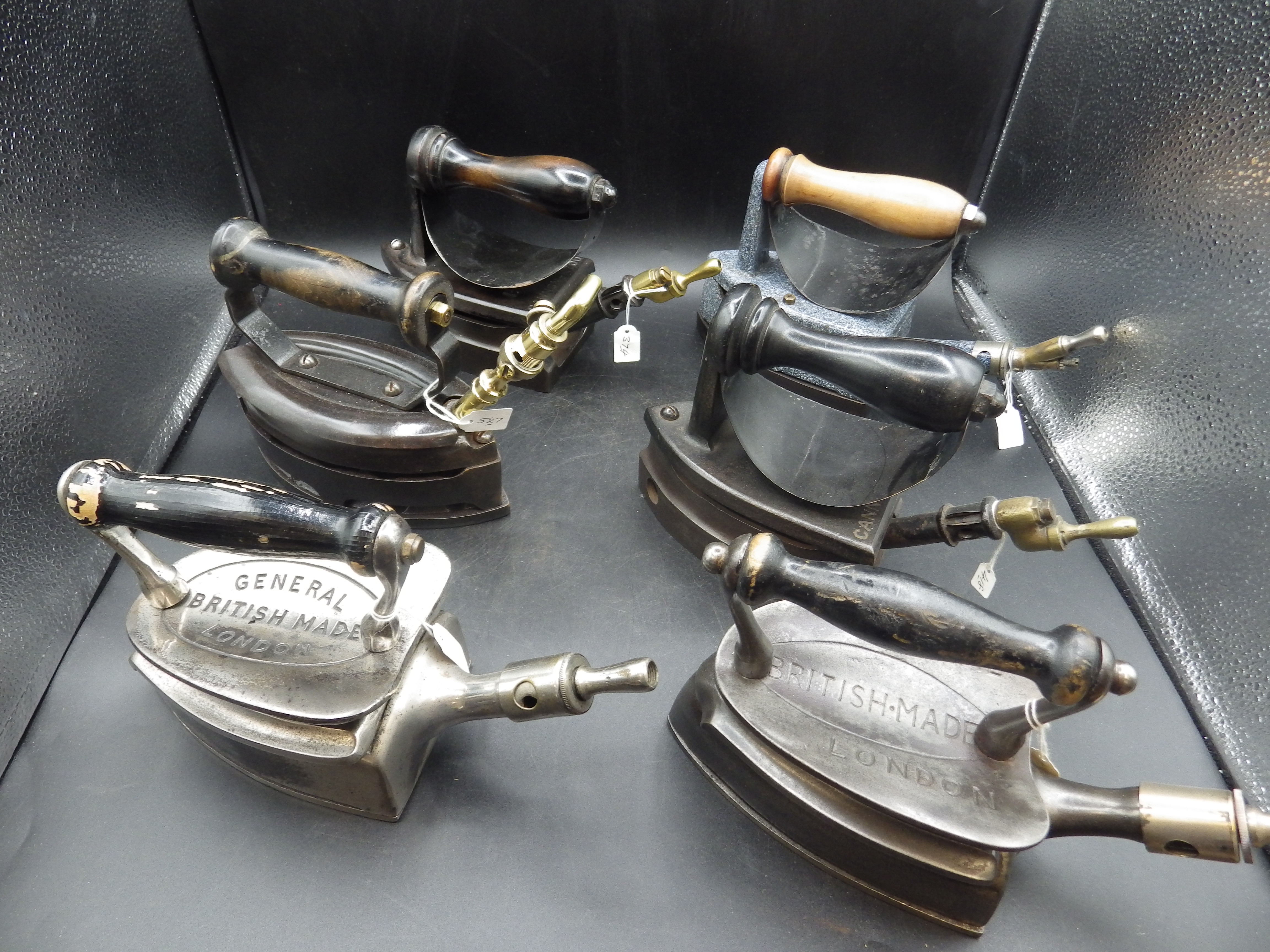 3 General gas irons - two marked British Made London, the third described as below stairs by
