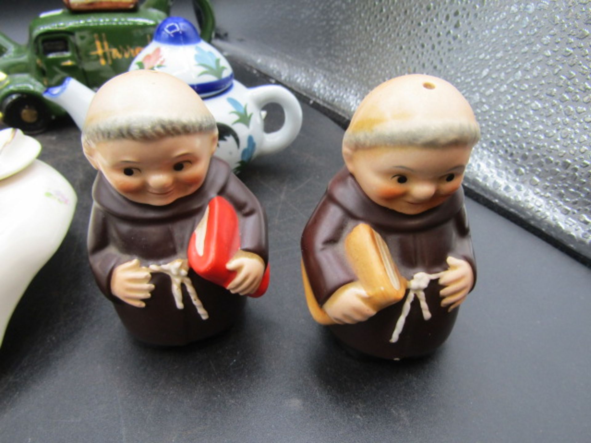 A collection of novelty teapots inc one enamelled and German priest cruet's - Image 2 of 7
