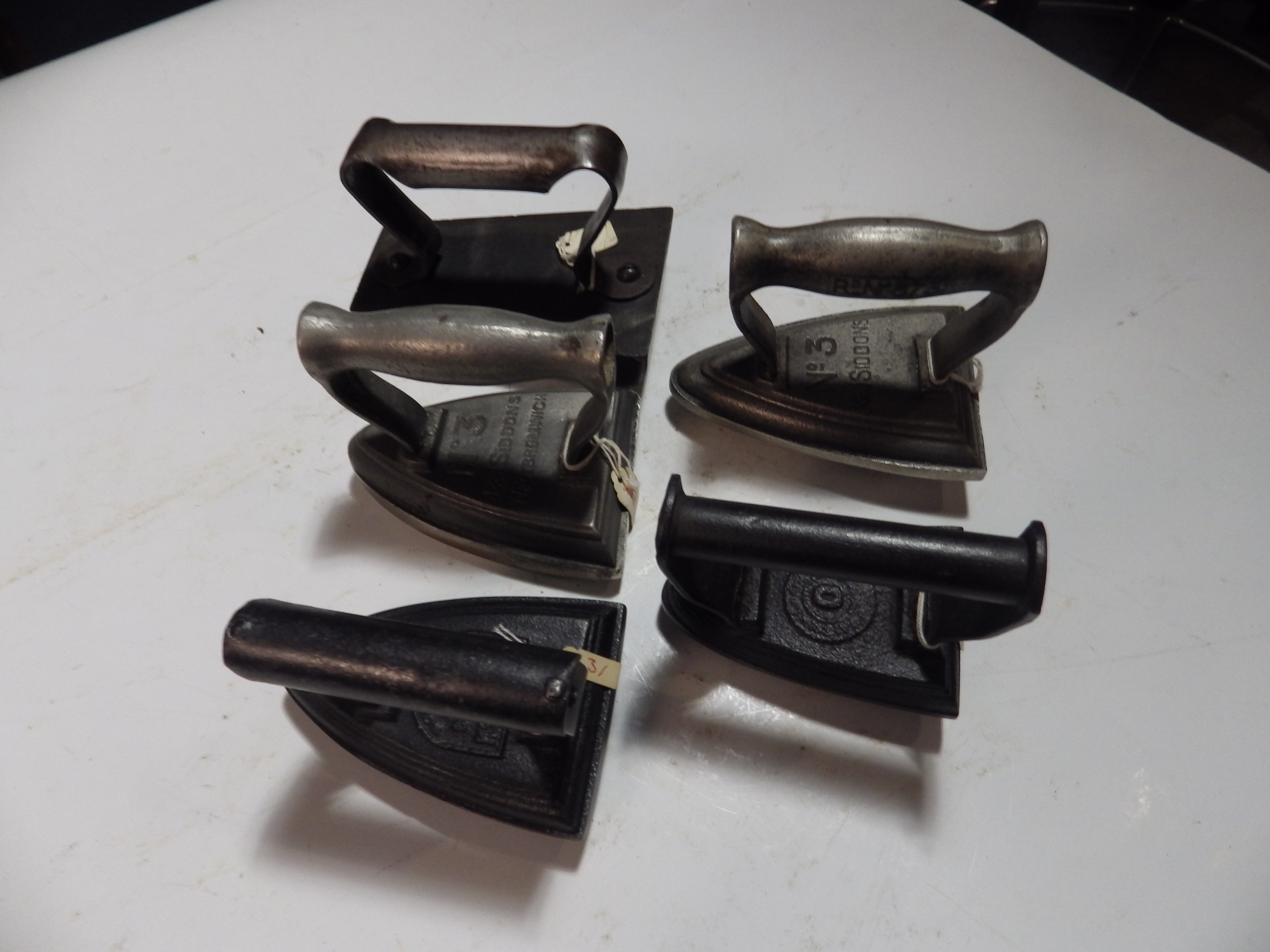 5 various polishing irons etc to incl J&J Siddons, Woodsetton Works etc