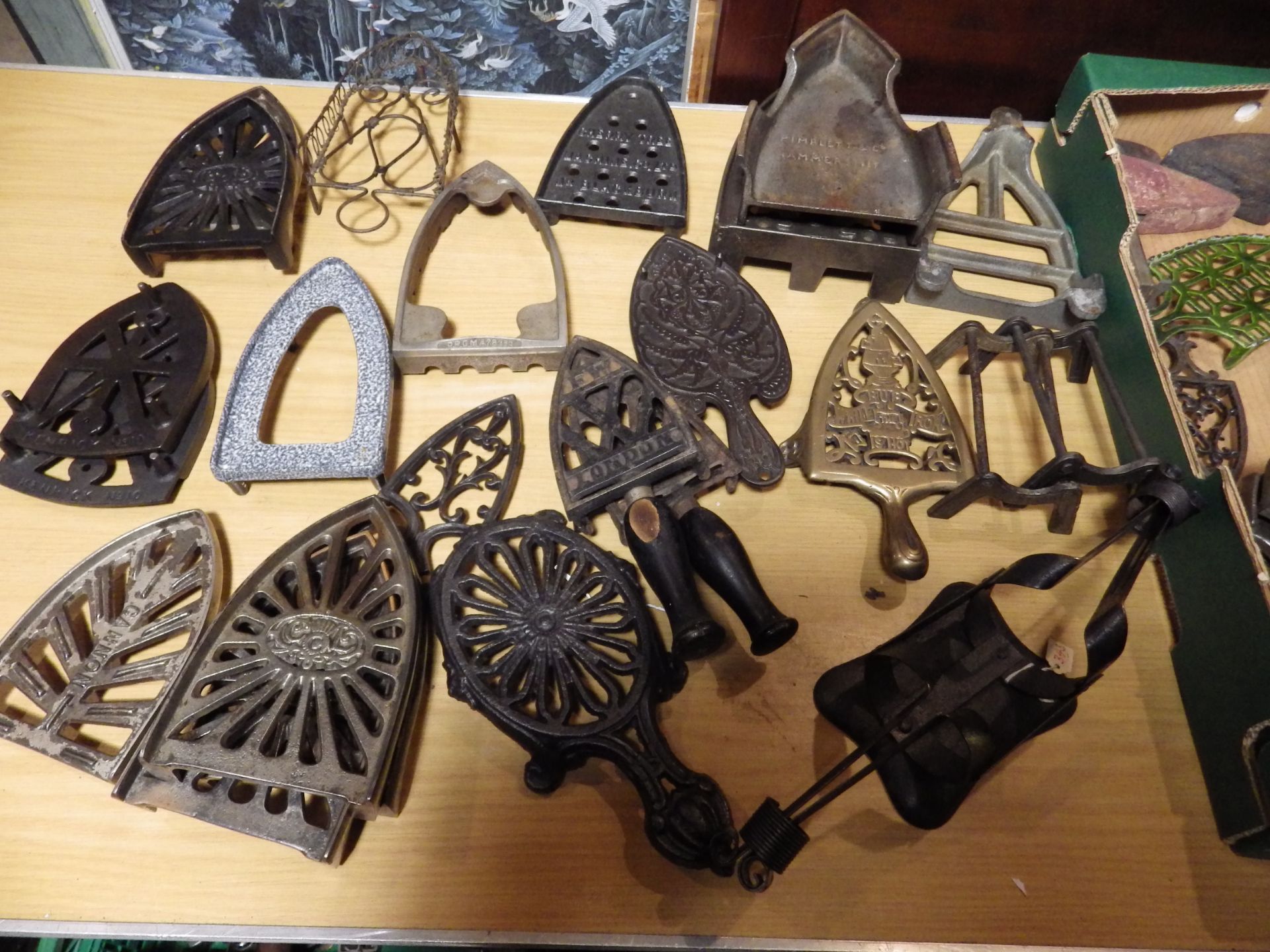 Tray of assorted iron trivets in various materials, slugs etc to include a french iron stand and - Image 3 of 3