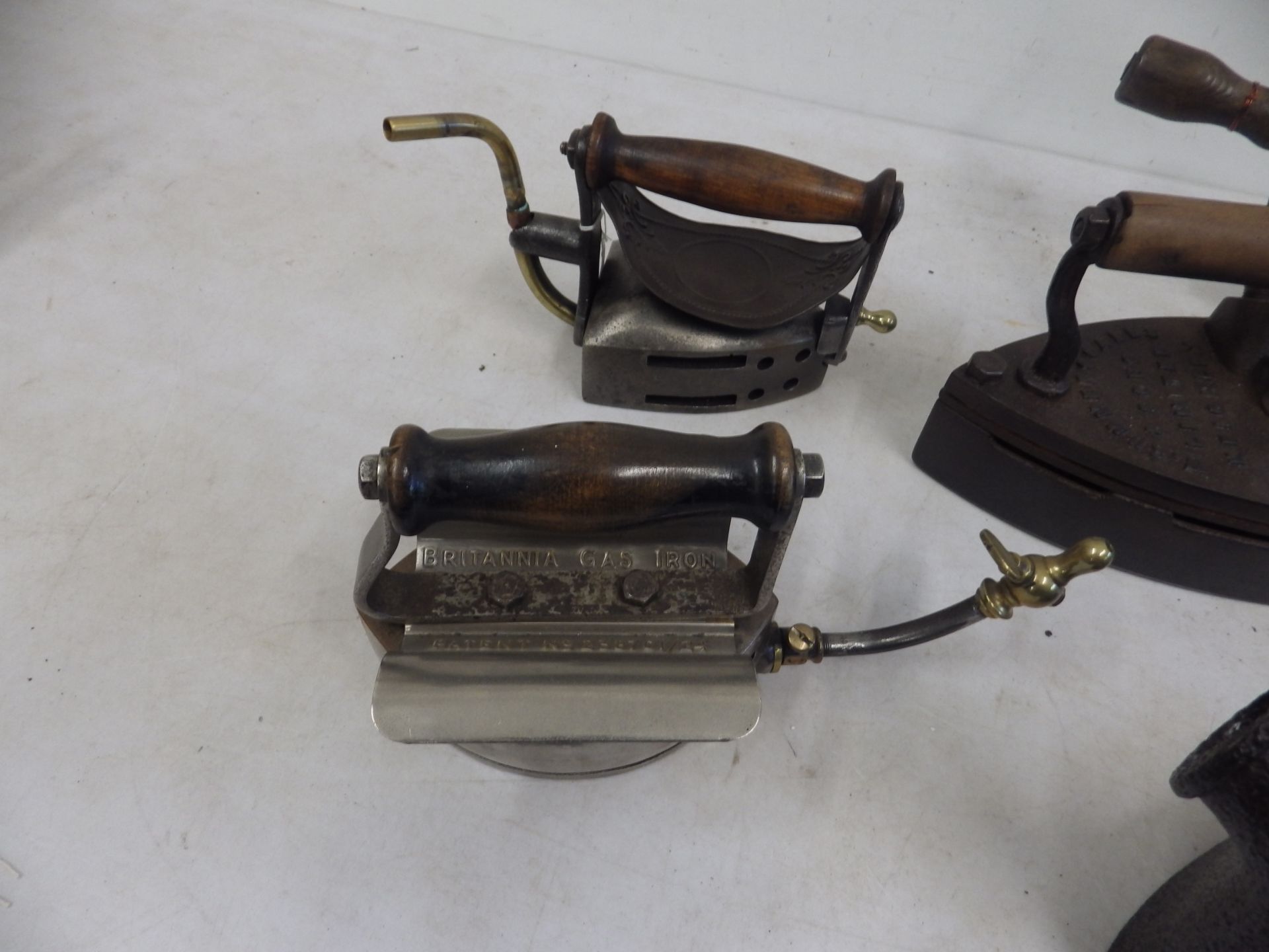 8 assorted gas irons to incl 2 x turn over gas irons, Brittania patent 238701/24, Izot? patent - Image 2 of 5