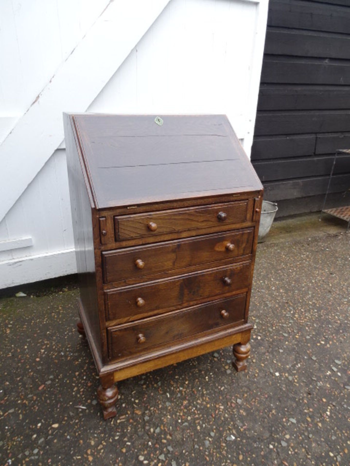 Small 4 drawer writing bureau with brass handles H96cm W59cm D44cm approx