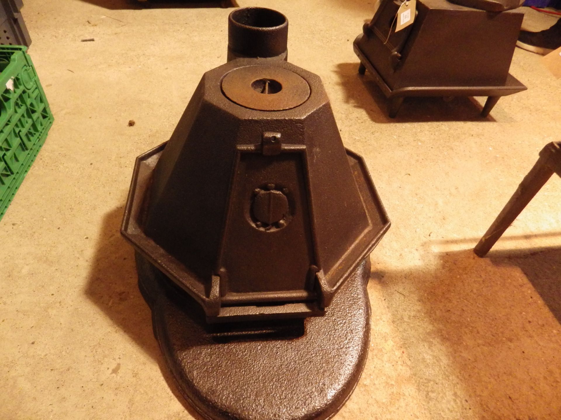 "Tortoise" cast iron stove - octagon shape stove with 6 iron rests, clue chimney and hinged door