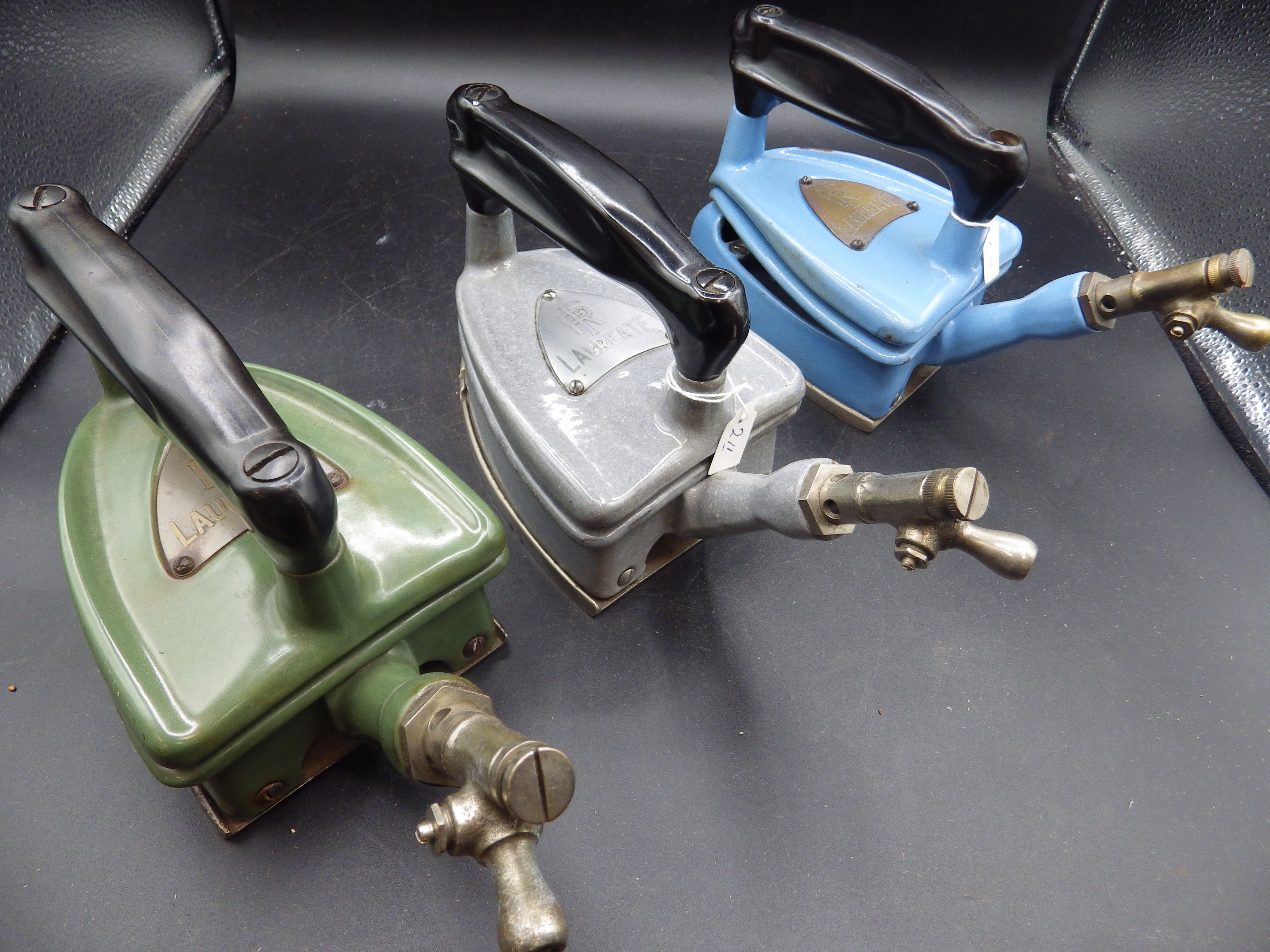 3 Fletcher Russell Laureate enamel gas irons in blue, green and grey