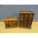 2 Miniature banks of drawers. Largest H30cm W24cm D18cm approx