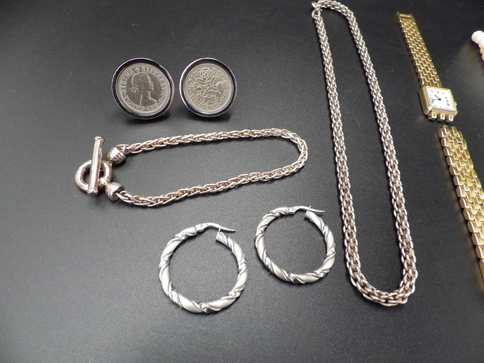 Jewellery lot to include a 925 silver chain, bracelet and hooped earings, a ladies Rotary watch a/ - Image 3 of 3
