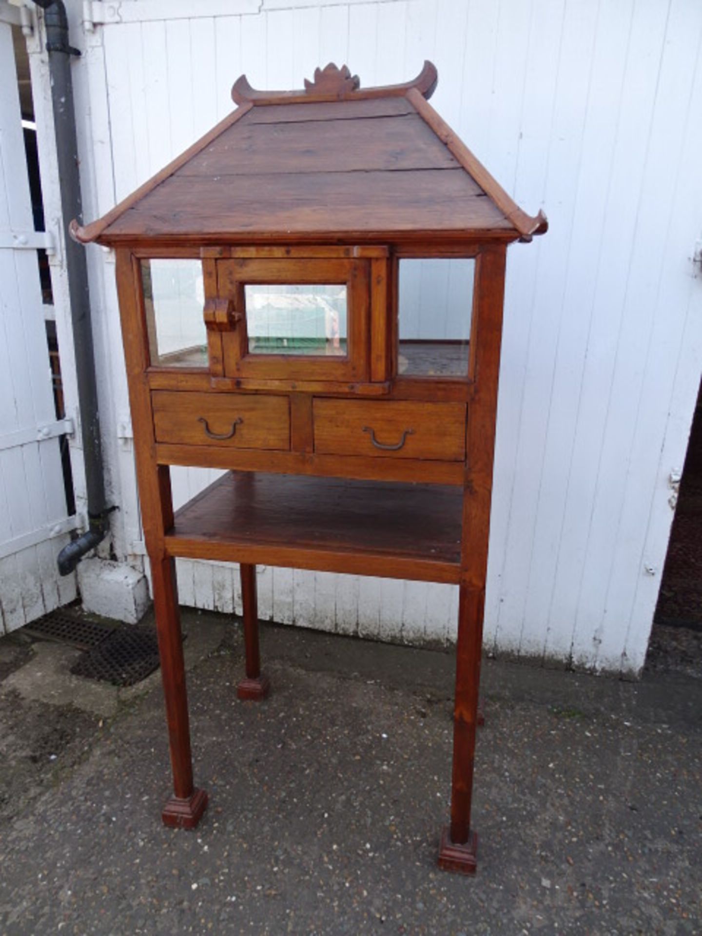Hardwood Chinese birdcage style display cabinet on legs with 2 drawers and glazed door H190cm