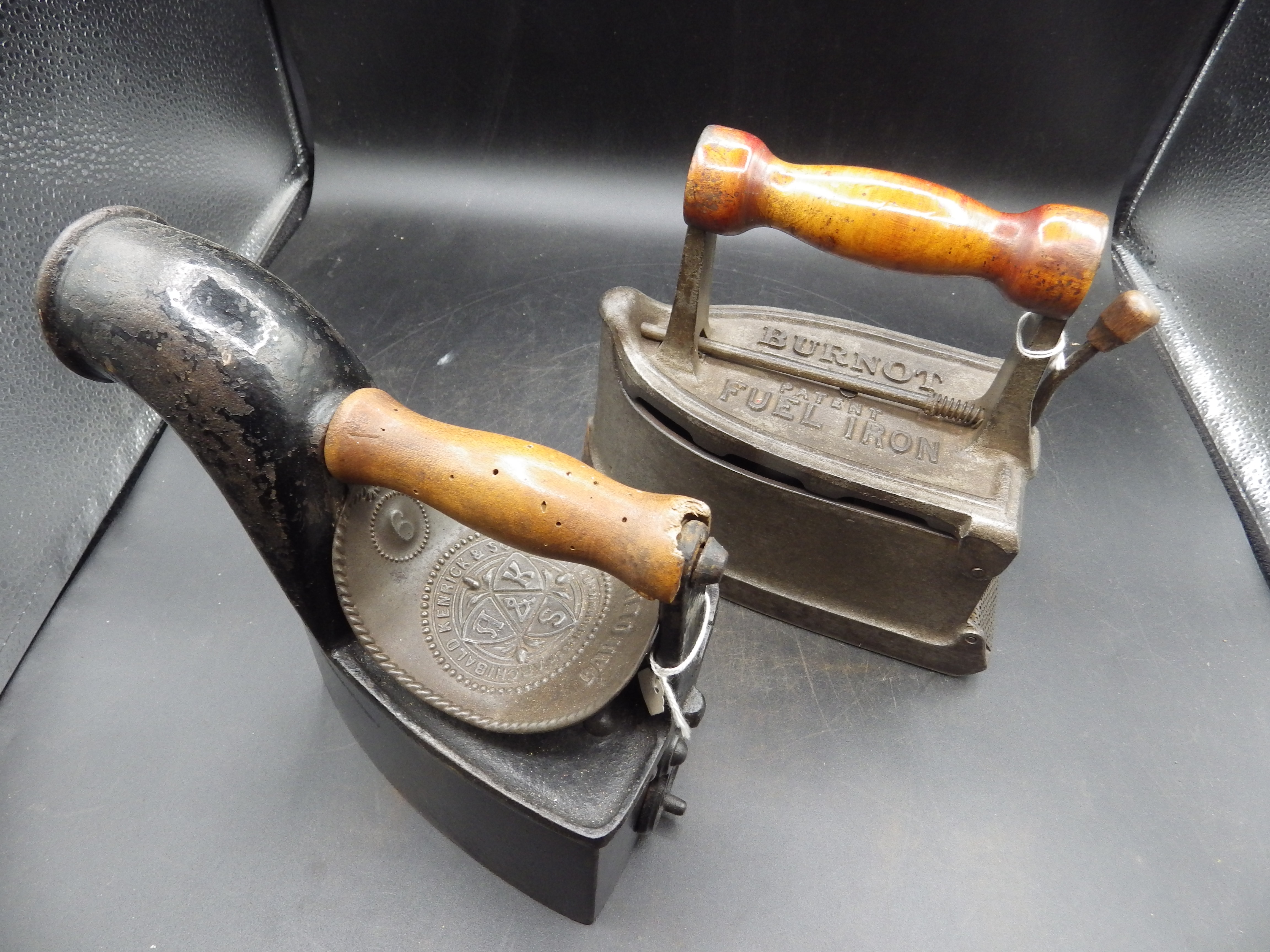 2 fuel irons to include the Burnot patent fuel iron with lever spring bolt and ash guard together