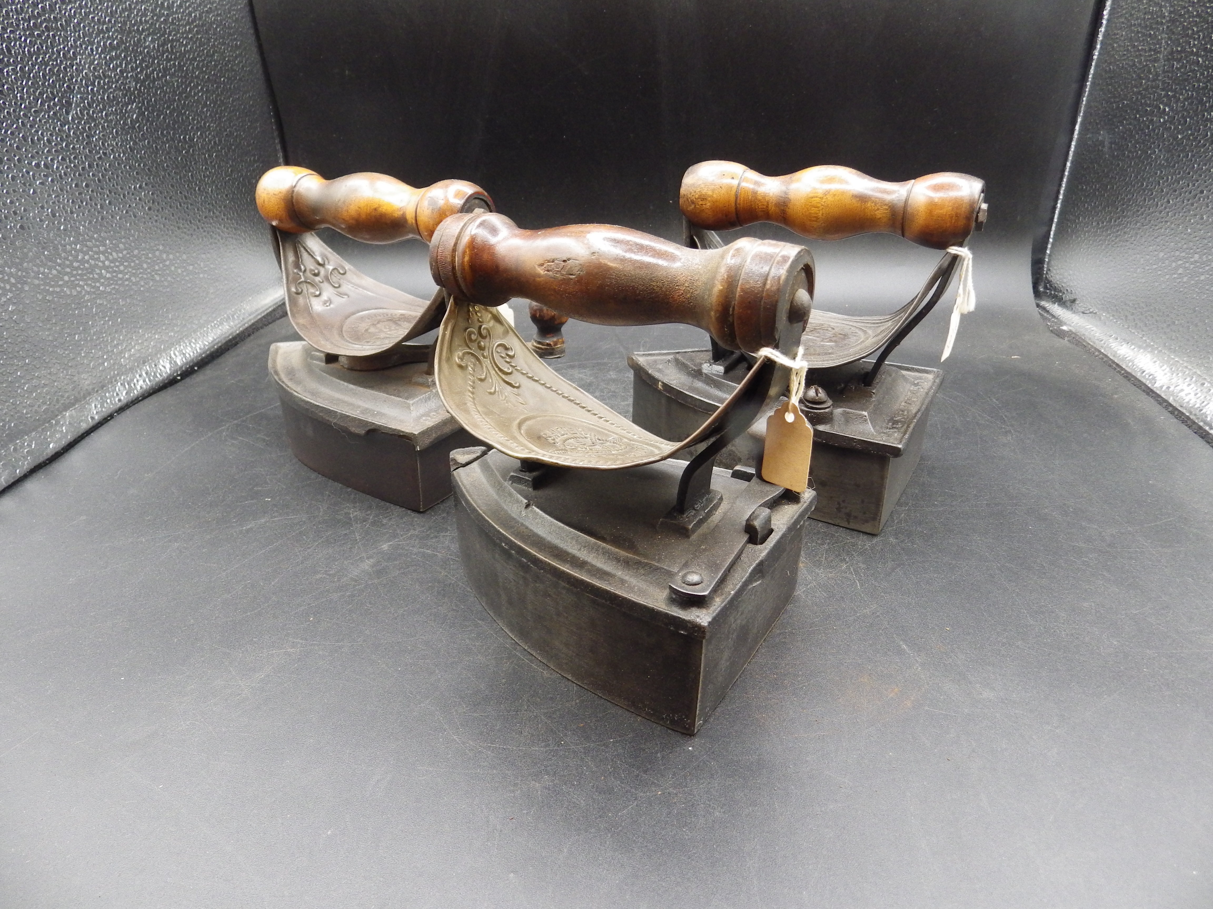 3 box irons with brass? heat shields and wooden handles together with slugs to incl 2x J & J Siddons - Image 4 of 6