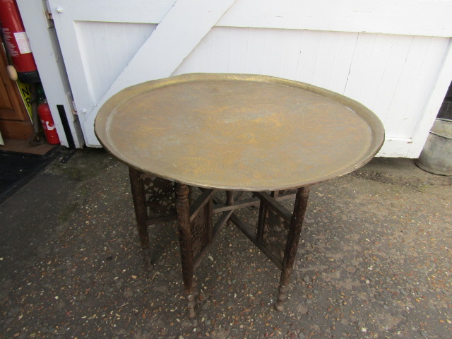 Eastern moorish table with brass tray top 85cmD 61cmH