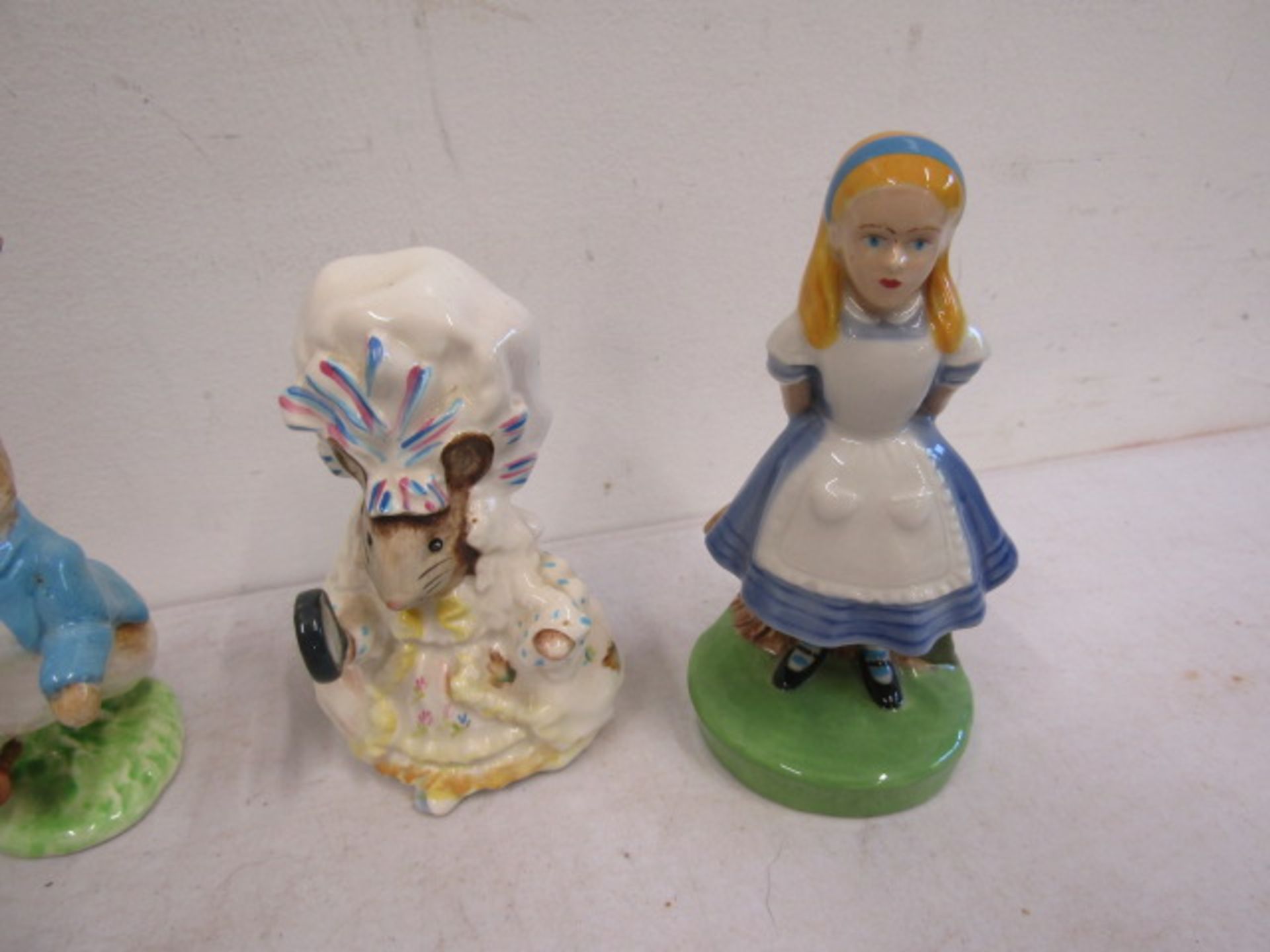 Royal Albert, Beswick Peter Rabbit figures plus an Alice in Wonderland figure - Image 2 of 6