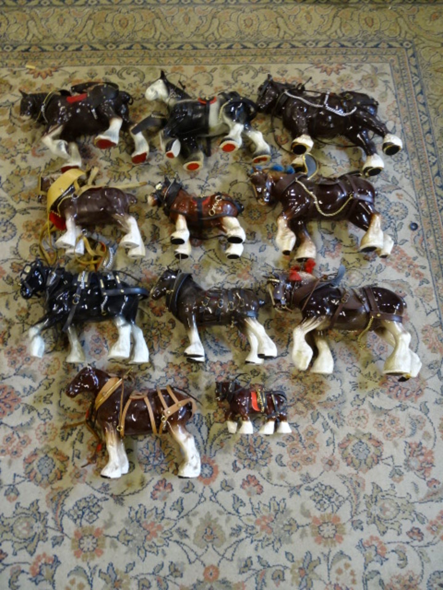Collection of Shire horses and carts (some horses have missing ears etc and most carts are in need