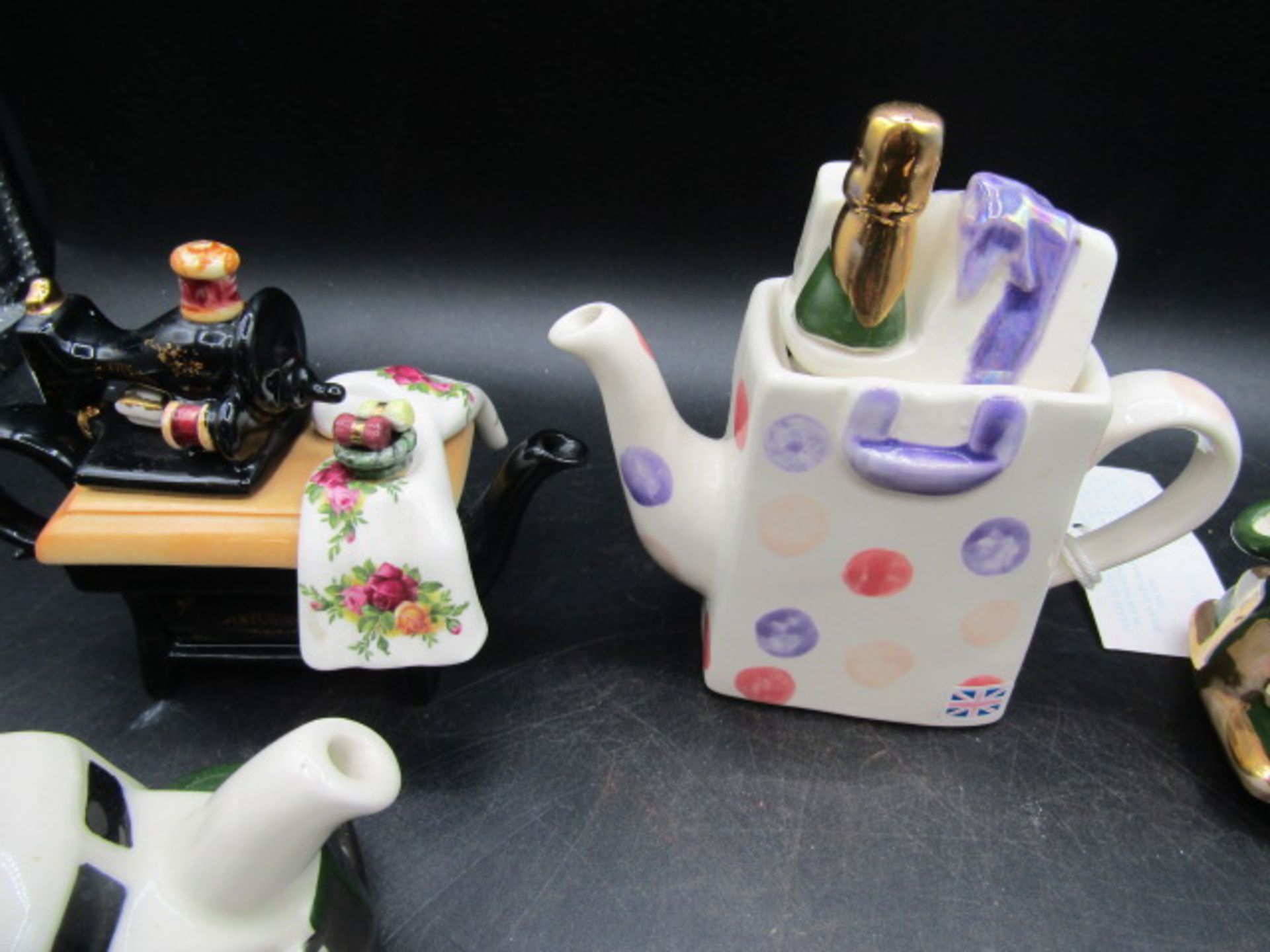A collection of novelty teapots inc one enamelled and German priest cruet's - Image 4 of 7