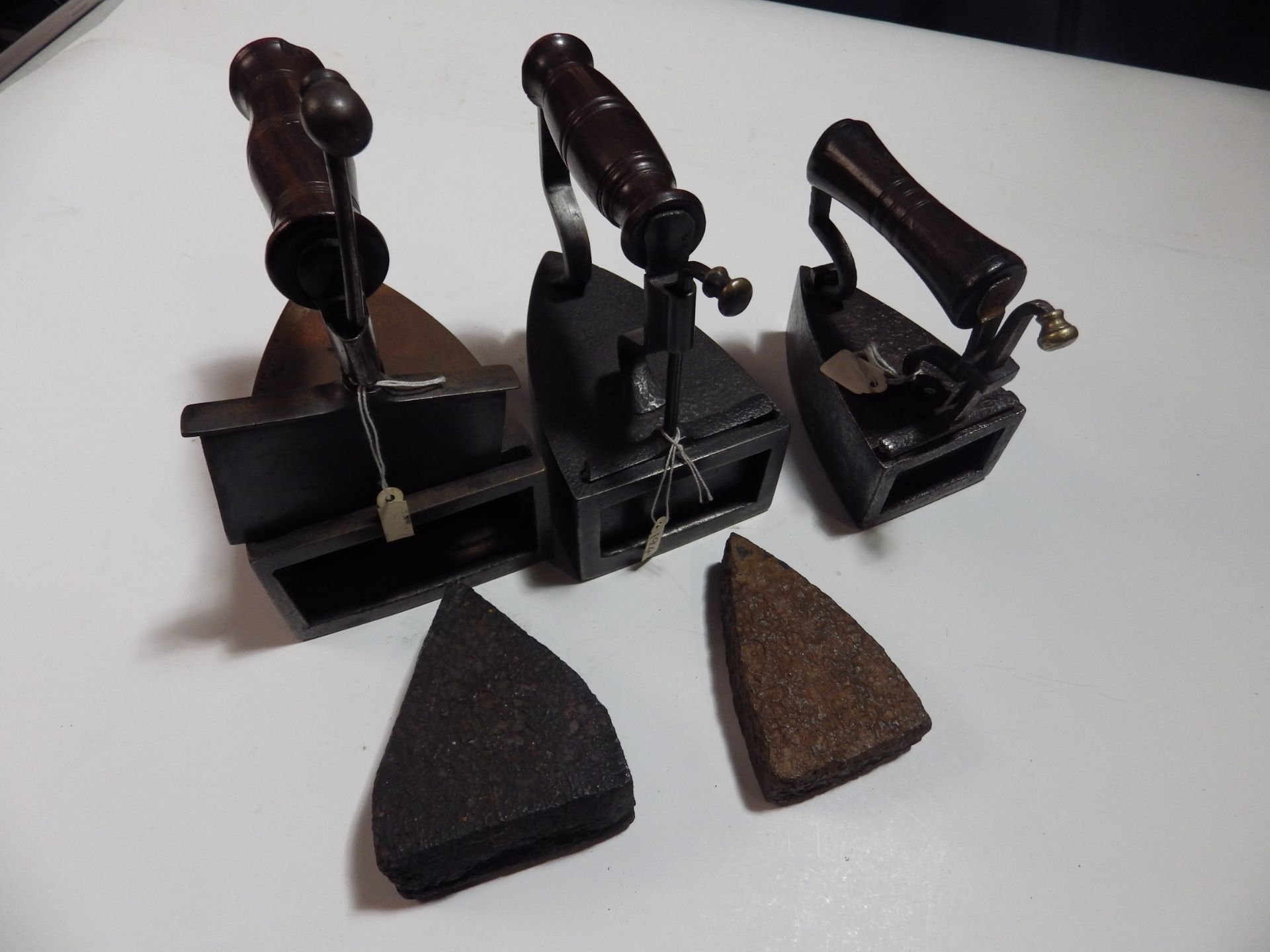 3 box irons with wooden handes of various sizes, 2 with slugs - Image 2 of 2