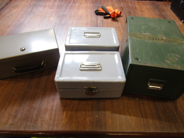 4 metal cash/storage tins and file