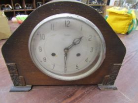 Mantel clock with key and pendulum