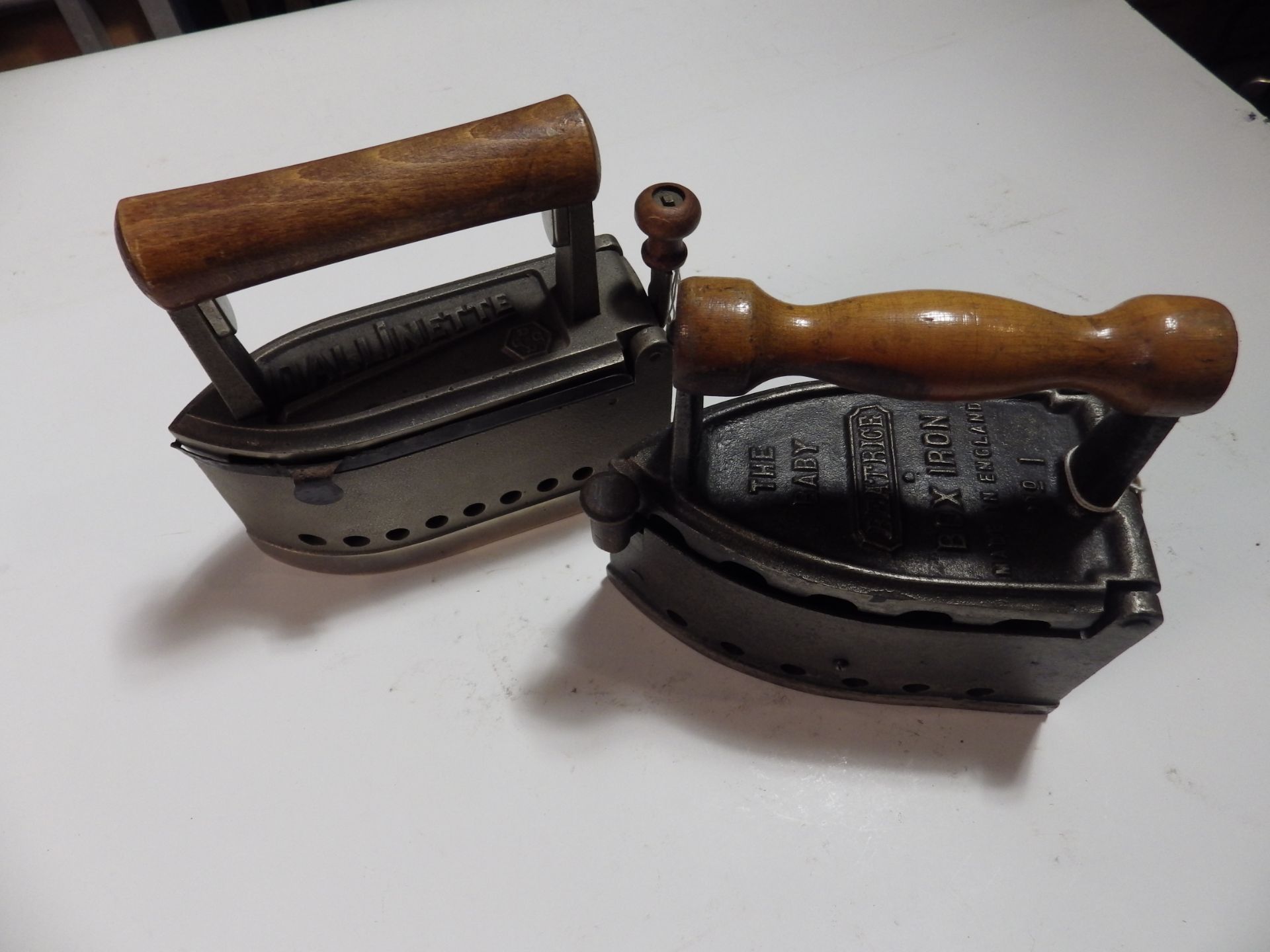 2 charcoal box irons to include 'The Baby Beatrice' and Dallinette