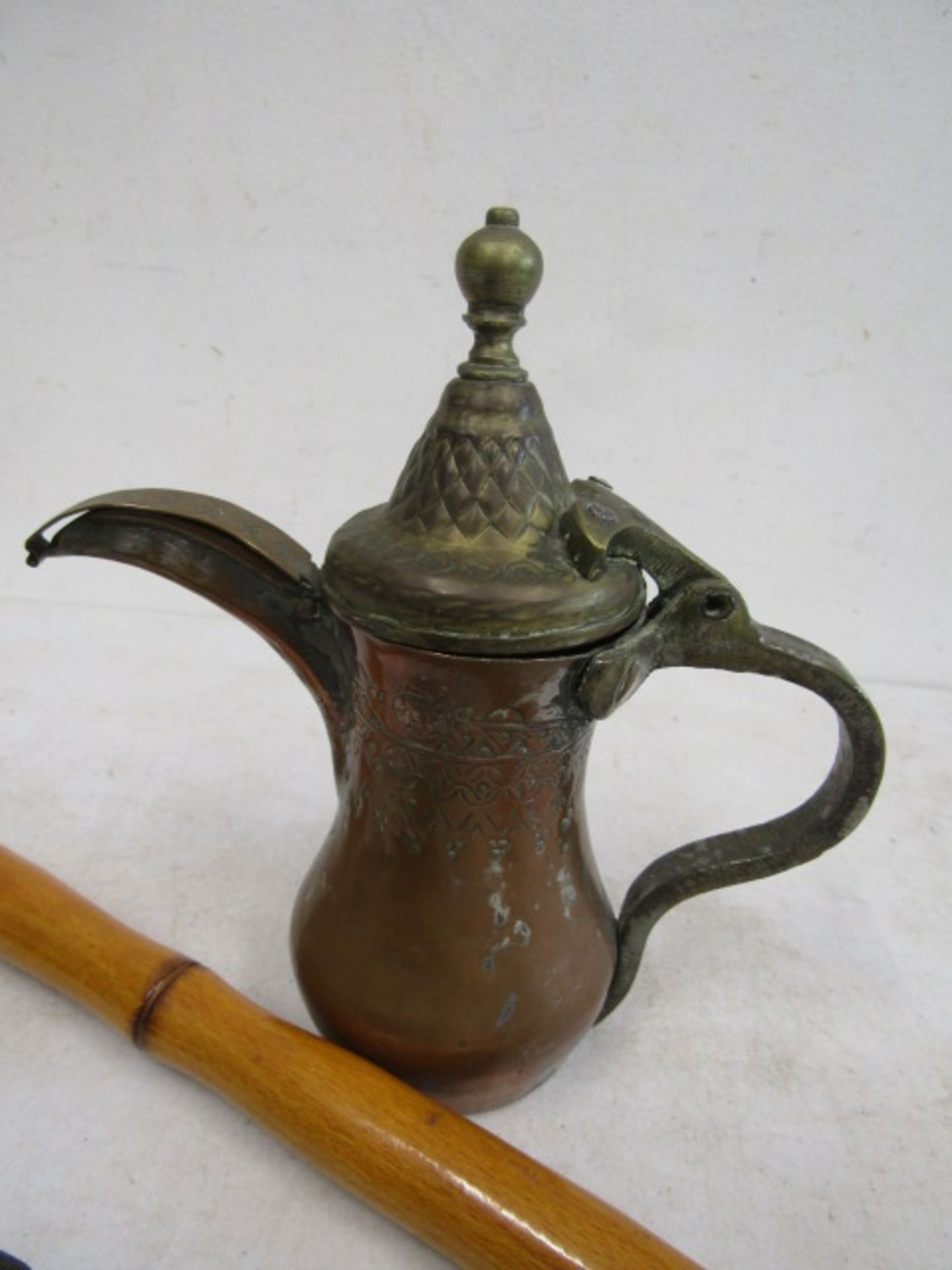 An Islamic teapot, walking cane and cow bell - Image 2 of 5