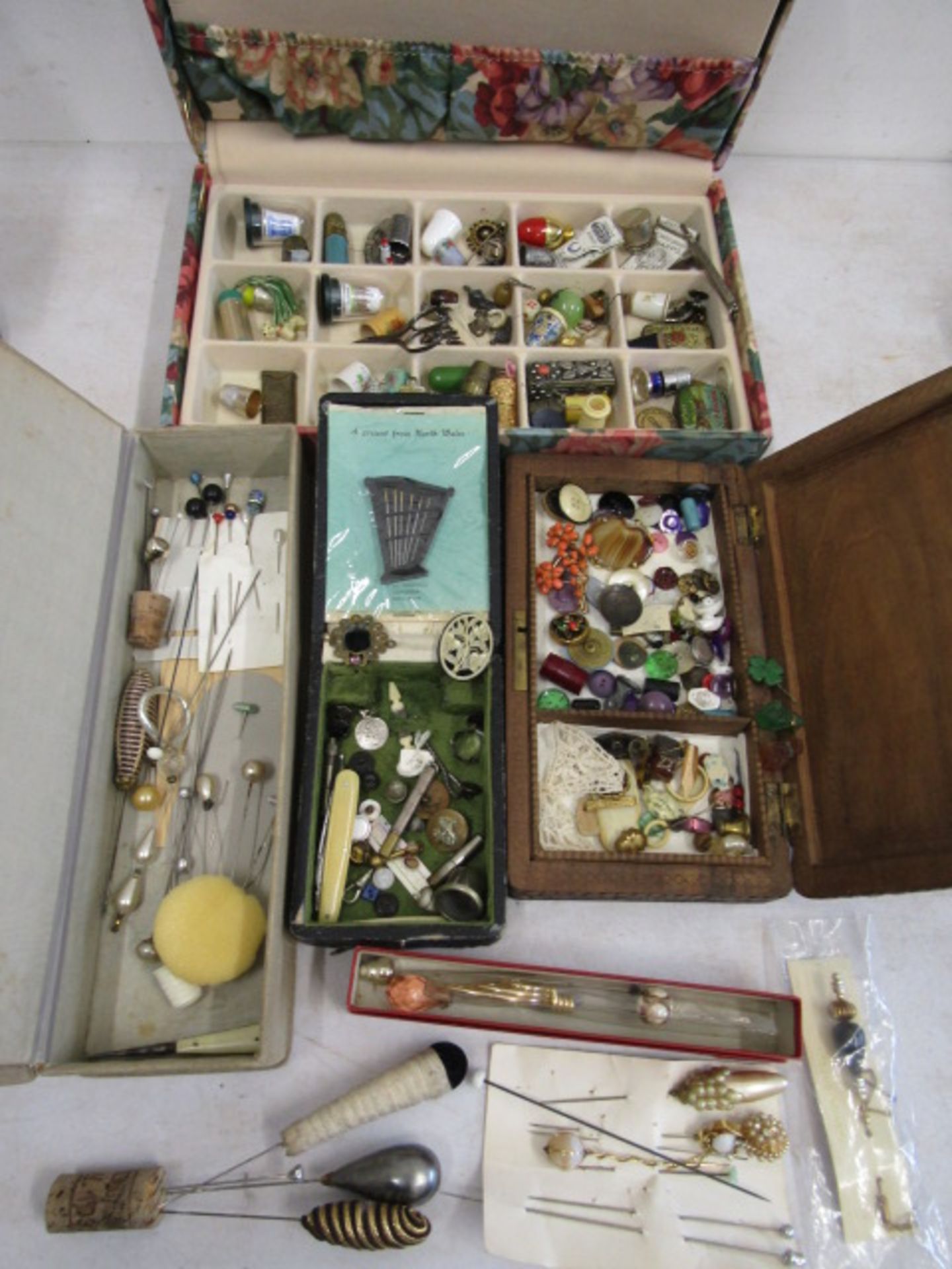 vintage sewing boxes with contents inc hatpins and small jade? dog