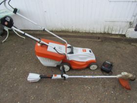 Stihl battery mower and strimmer with battery in working order and charger working