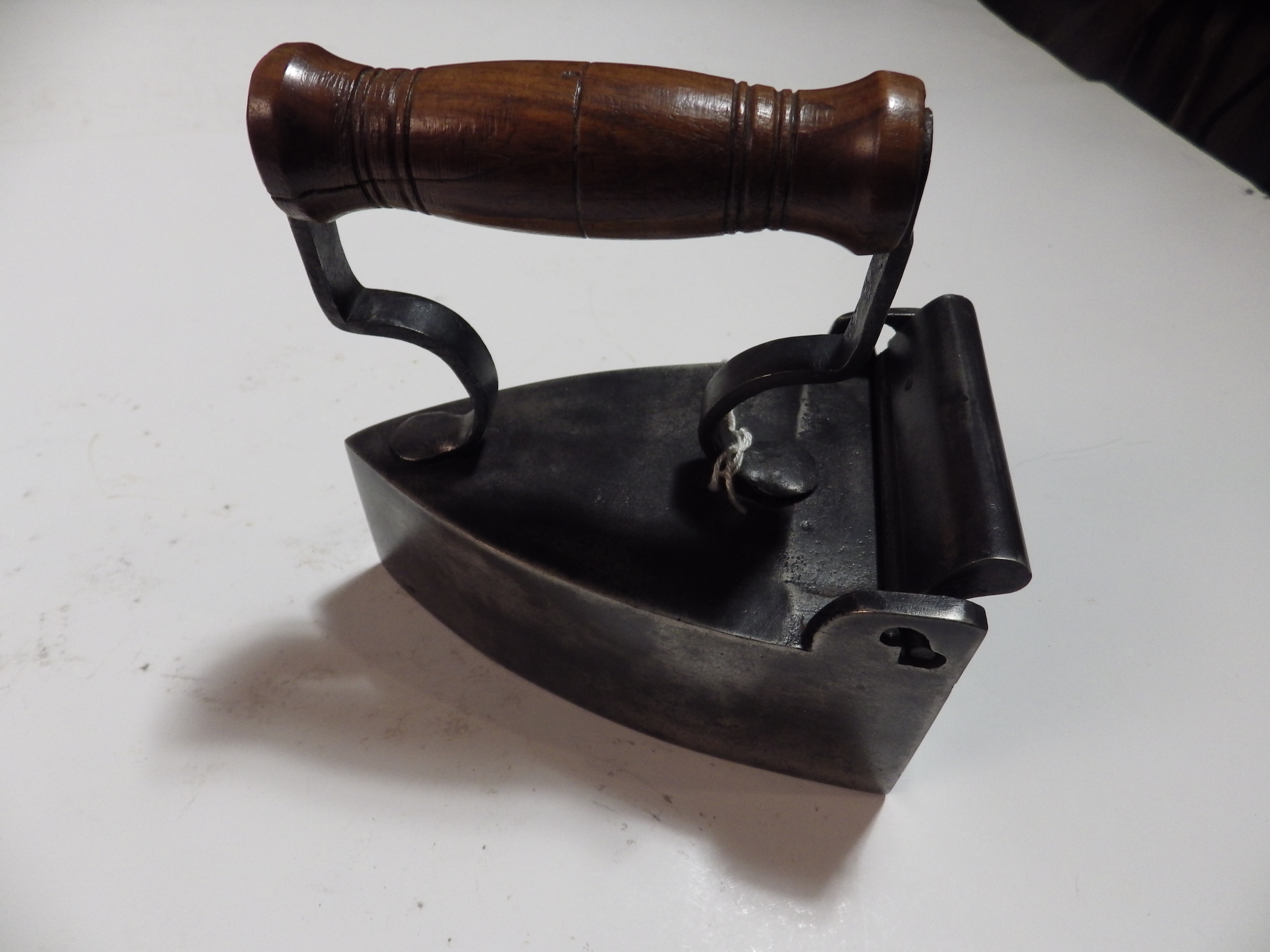 Up and over box iron with wooden handle Eve? & Rowlands patent automatic